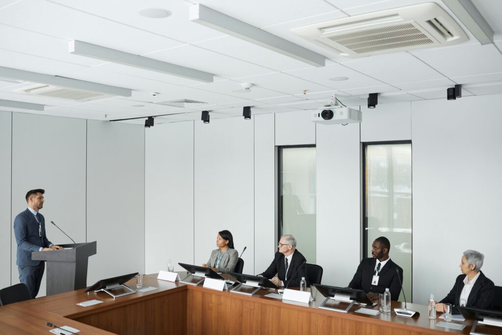 Professional speaking confidently during an international business meeting